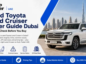Used Toyota Land Cruiser SUV parked in Dubai with city skyline in the background