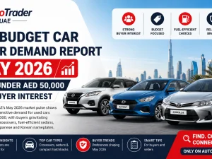 Used budget cars under AED 50,000 lined up in a UAE dealership parking area