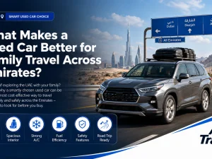 Family driving in a used SUV on a highway between Emirates in the UAE