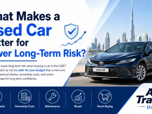 Used cars parked in a UAE dealership lot representing lower long-term risk options