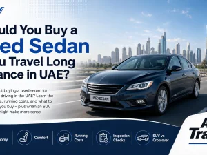 Used sedan driving long distance on a UAE highway