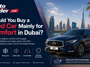 Used mid-size sedan driving on a Dubai highway, showcasing a comfortable interior