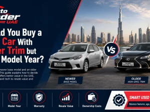 Used car comparison between newer base model and older high trim in the UAE