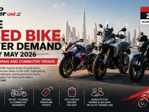 Used sport and touring motorcycles parked in a UAE urban setting at sunset