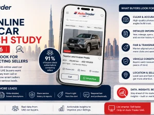 Used car buyer browsing Auto Trader UAE listings on a laptop in Dubai