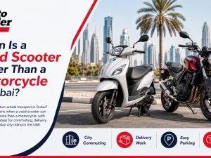 Used scooter parked in Dubai city street, with skyscrapers in the background