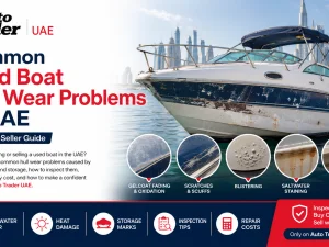 Used fiberglass boat hull being inspected for wear and damage in a UAE marina