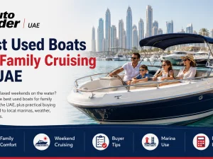 Family cruising on a used boat in UAE waters at sunset