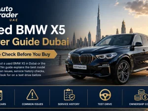 Used BMW X5 parked in Dubai with city skyline in the background