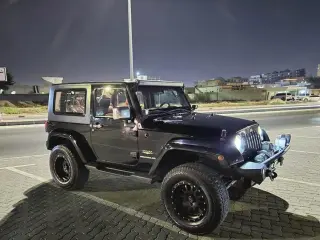 2009 Jeep Wrangler في Abu Dhabi سيارة مستعملة
