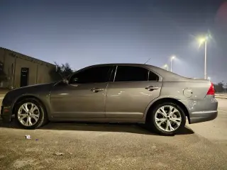 2012 Ford Fusion في Abu Dhabi سيارة مستعملة