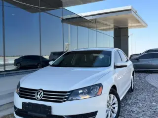 2014 Volkswagen Passat في Abu Dhabi سيارة مستعملة
