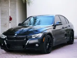 2015 BMW 3-Series في Abu Dhabi سيارة مستعملة