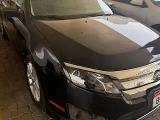 2010 Ford Fusion في Abu Dhabi سيارة مستعملة