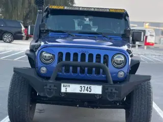 2014 Jeep Wrangler Unlimited في Dubai سيارة مستعملة