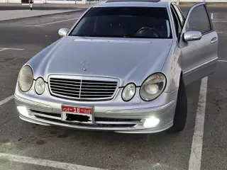 2003 Mercedes-Benz E-Class في Al Ain سيارة مستعملة