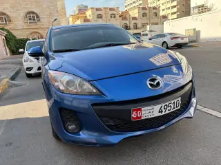 2014 Mazda 3 في Abu Dhabi سيارة مستعملة