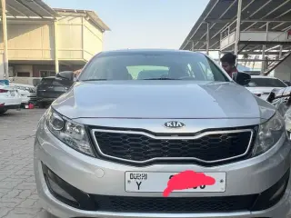 2013 Kia Optima في Dubai سيارة مستعملة