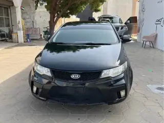 2010 Kia Cerato في Fujairah سيارة مستعملة