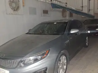 2014 Kia Optima في Dubai سيارة مستعملة