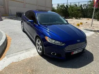 2016 Ford Fusion في Abu Dhabi سيارة مستعملة