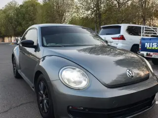 2014 Volkswagen Beetle في Dubai سيارة مستعملة