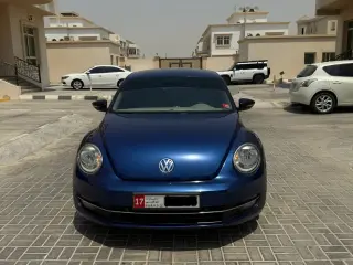 2015 Volkswagen Beetle في Abu Dhabi سيارة مستعملة