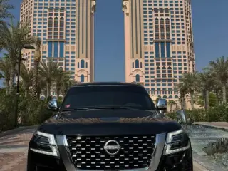 2013 Nissan Patrol في Abu Dhabi سيارة مستعملة