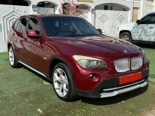 2011 BMW x1 في Al Ain سيارة مستعملة