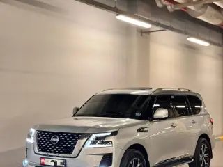 2014 Nissan Patrol في Abu Dhabi سيارة مستعملة