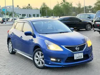 2014 Nissan Tiida في Dubai سيارة مستعملة