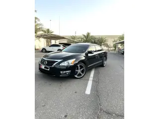 2014 Nissan Altima في Abu Dhabi سيارة مستعملة