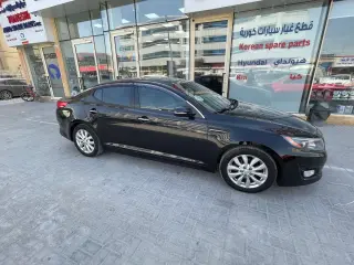 2014 Kia Optima في Dubai سيارة مستعملة