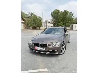 2013 BMW 3-Series في Abu Dhabi سيارة مستعملة