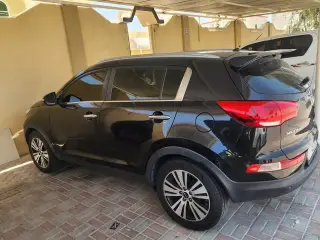2015 Kia Sportage في Abu Dhabi سيارة مستعملة