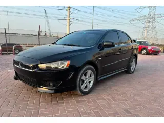 2009 Mitsubishi Lancer في Dubai سيارة مستعملة
