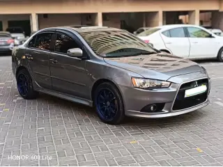 2015 Mitsubishi Lancer في Sharjah سيارة مستعملة